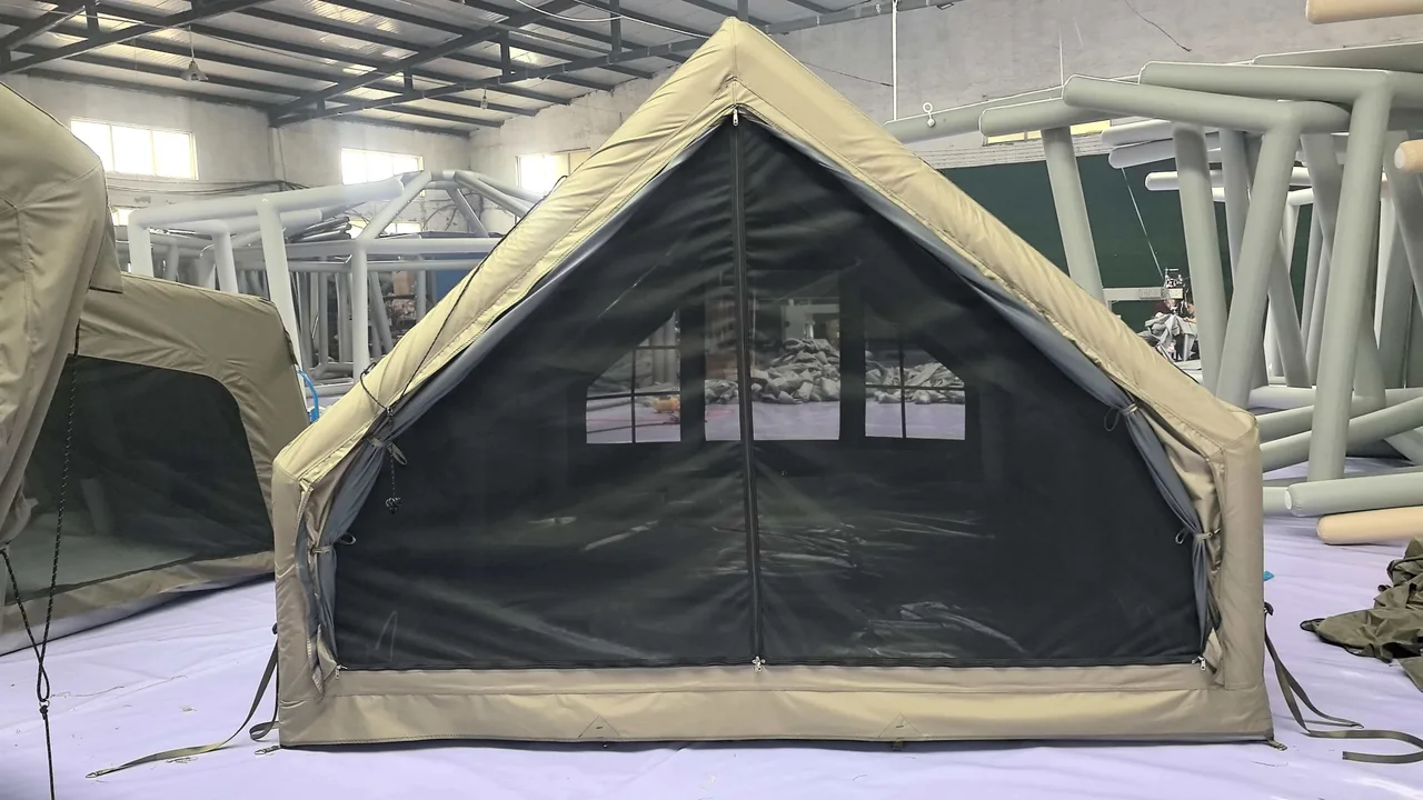 Open mesh entrance on an LT-12 inflatable cabin tent inside the workshop